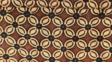 une traditionnel indonésien tissu, à savoir batik tissu lequel a unique et différent motifs et image motifs pour chaque région. culturel thème Photos, typique de Asie. photo