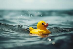 ai généré caoutchouc Jaune canard dans le mer. produire ai photo