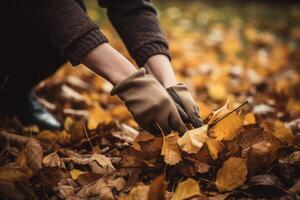 ai généré mains avec gants ratissage l'automne feuilles. produire ai photo