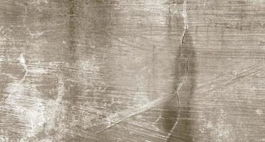 texture de ciment fissuré gris pour le fond. rayures murales photo