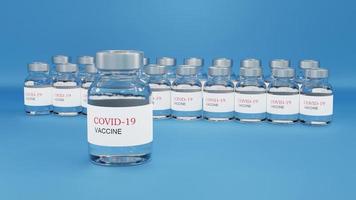 beaucoup de flacons de vaccin covid-19 contiennent un liquide clair sur fond bleu