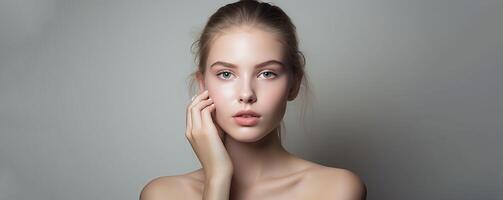 ai généré magnifique femme avec radiant, Frais et en bonne santé peau, serein expression et doux main sur affronter. beauté et en bonne santé bannière concept photo