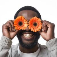 ai généré africain américain homme couvertures yeux avec deux Orange Gerberas photo