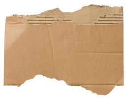 pièce de marron papier carton avec déchiré bords sur isolé Contexte photo
