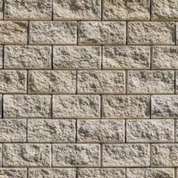 Contexte de le mur de blanc brique. Jaune beige brique. brique texture. bâtiment Contexte. petit articles photo