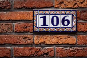 décoré maison nombre sur brique mur dans L'Europe . Bruges Bruges, photo