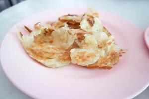 rôti ou Naan , frit rôti avec sucré condensé Lait photo