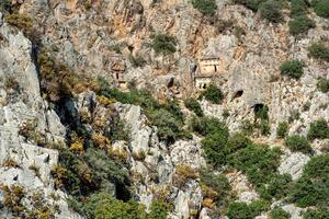 rocheux nécropole avec taille en pierre tombes dans myra lycien demre, dinde photo