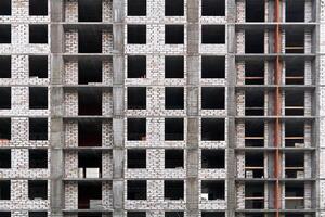 Contexte - une mur de une bâtiment en dessous de construction photo