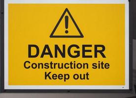 chantier de construction de danger garder hors signe photo