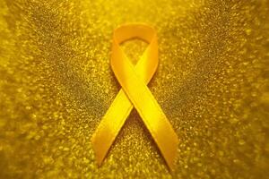 or ruban pour les enfants comme une symbole de enfance cancer conscience. monde cancer journée photo