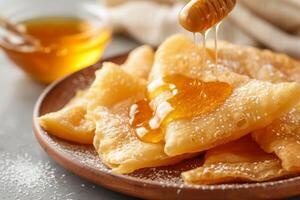 ai généré fait maison Profond frit sopapillas avec Miel. génératif ai photo