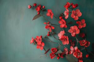 ai généré rouge floraison branches propager à travers une turquoise Contexte photo