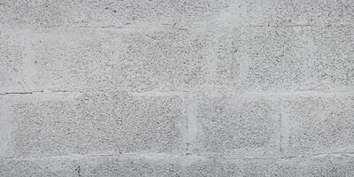 gris brique cendre bloquer mur Contexte béton tuile bardage sans couture texture photo