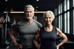 ai généré portrait de actif Sénior content souriant couple famille permanent dans Gym après Faire entraînement. photo