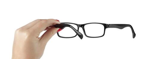 femelle main en portant une encadré noir des lunettes isolé sur blanc Contexte photo