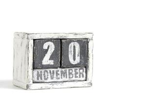 novembre 20 sur en bois calendrier, sur blanc Contexte. photo