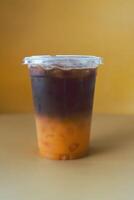 americano café mixte avec Orange jus. la fusion boisson photo