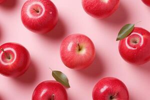 ai généré délicieux mûr rouge Pomme avec feuilles sur une rose Contexte Haut vue des fruits Contexte photo