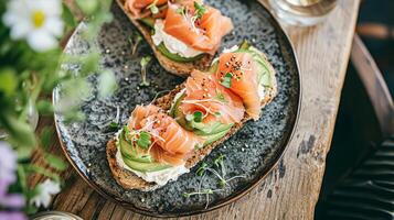 ai généré Avocat pain grillé avec fumé Saumon pour petit-déjeuner, fait maison cuisine et traditionnel nourriture, pays la vie photo