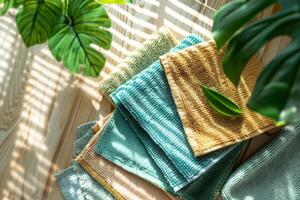 ai généré éco amical réutilisable et durable nettoyage chiffons dans vert et bleu couleurs. génératif ai photo