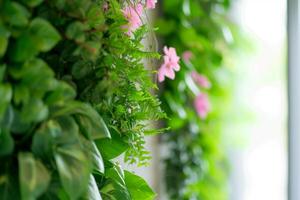 ai généré intérieur avec floral verticale jardins. vert mur. génératif ai photo