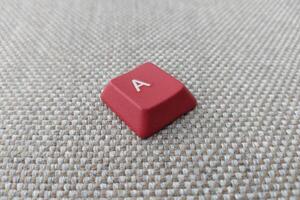 clavier avec rouge lettre une sur une gris Contexte photo