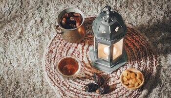 ai généré traditionnel Ramadan et eid lanterne lampe avec croissant lune, Rendez-vous et des fruits dans une bol sur tapis, généré ai photo