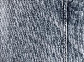 texture et couture du tissu denim photo