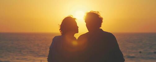 ai généré personnes âgées couple à le coucher du soleil plage. concept de Sénior l'amour. photo