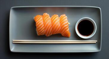 ai généré une assiette de Sushi a Saumon et baguettes photo
