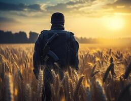 ai généré une soldat avec une arme dans le sien mains des stands dans une blé champ à coucher de soleil, arrière vue photo