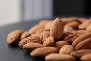 fermer de amande, écrou nourriture, marron amandes photo