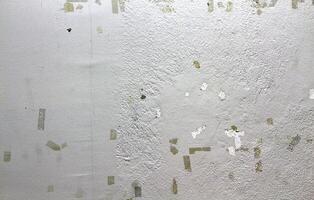 traces de Plastique ruban sur le béton et en bois mur. photo