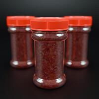 froid sauce ou ketchup dans Plastique bouteille fabriqué de rouge chaud le Chili poivrons. indonésien le Chili pimenter. maquette pour logo ou conception photo