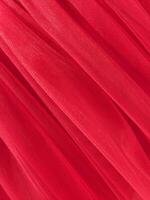 rouge engrener tissu. rouge en tissu Contexte. usine texture photo