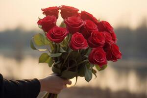 ai généré une bouquet de rouge des roses tenir dans main photo