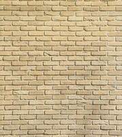 motif de mur de briques sombres avec ordre de maçonnerie chaotique. texture d'arrière-plan ou ressource pour la texturation 3d. beaucoup de briques dans un grand mur de pierre moderne photo