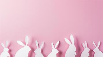 ai généré Pâques lapin papier Couper sorties sur rose photo