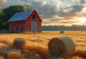 ai généré rouge Grange et foins balles dans champ à le coucher du soleil photo