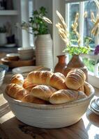 ai généré fraîchement cuit pain Rouleaux dans panier sur en bois table photo