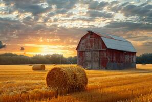 ai généré rouge Grange et foins balles asseoir dans champ à le coucher du soleil photo