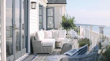 ai généré blanc côtier chalet terrasse décor dans le Anglais campagne style avec une vue sur la mer par le bord de mer, Accueil décor et intérieur conception photo