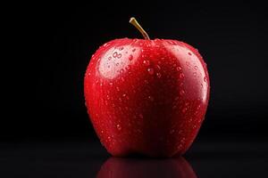 ai généré de face vue humide rouge mûr Pomme sur noir arrière-plan, fruit avec l'eau gouttes photo