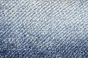 denim texture Contexte dans bleu jeans en tissu photo