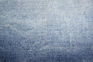 denim texture Contexte dans bleu jeans en tissu photo