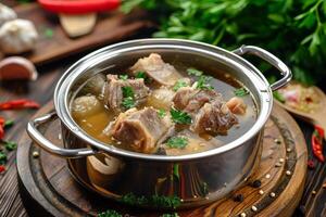 ai généré traditionnel du boeuf bouillon avec légume, des os et Ingrédients dans pot photo