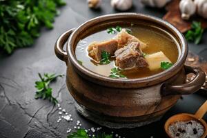 ai généré traditionnel du boeuf bouillon avec légume, des os et Ingrédients dans pot photo