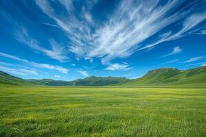 ai généré balayage Prairie avec vibrant vert herbe de premier plan à en couches collines en dessous de une brillant bleu ciel avec vaporeux des nuages. photo