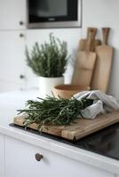 ai généré blanc minimal cuisine et liasses de vert Romarin photo
